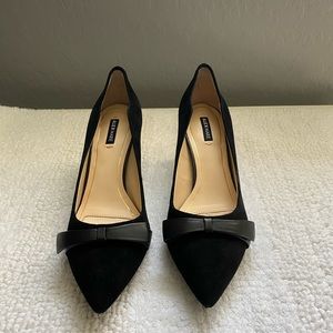 Black suede pumps